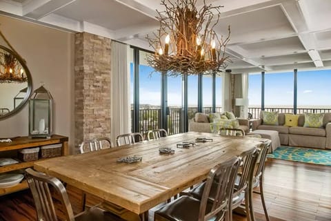Large open dining and living area with ocean views.
