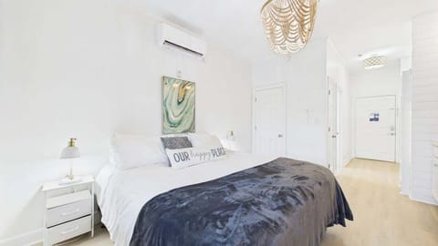 King bed and TV in living area (sleeps 2)