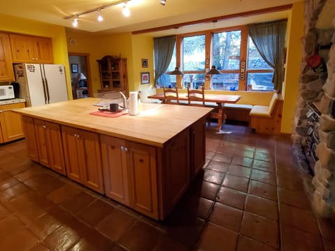 MAIN FLOOR KITCHEN FROM ENTRANCE 