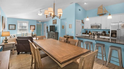 Sandy Teauxs Dining Table, Kitchen, and Living Room