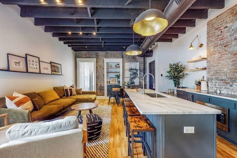 Living Room: We made sure to design this area with an open layout that connects the living room, dining area, and kitchen, giving the whole space a seamless and roomy feel.