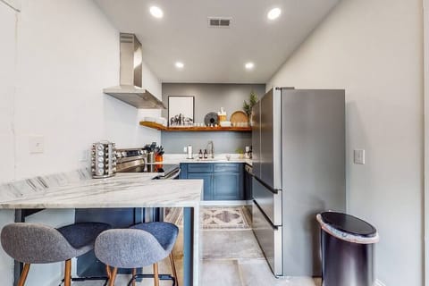 Kitchen: Our modern kitchen offers ample space for you and your loved ones to prepare delicious meals.