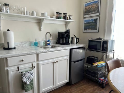 Kitchenette - Keurig coffee machine, small frig, microwave , hot water kettle, and small air-fryer