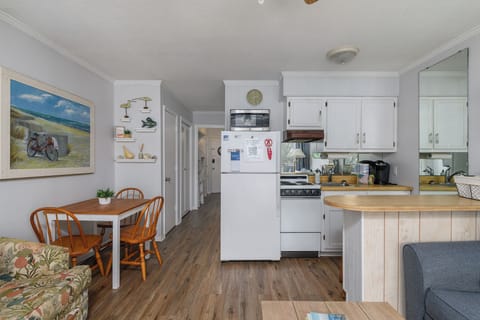Breakfast table and good size fridge