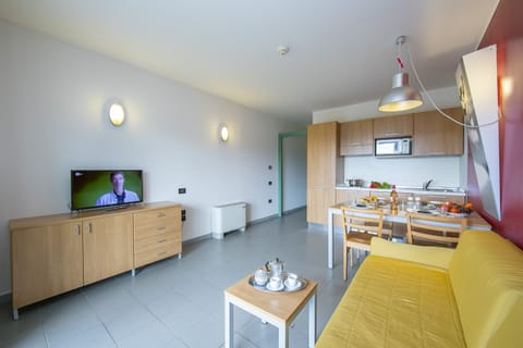 living room with kitchen and dining table view