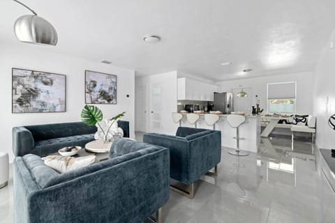 Lay back on the plush living room and stream your favorite shows on the big screen TV