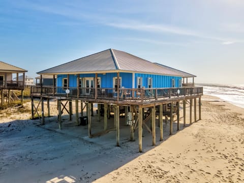 Beachfront property with direct beach access and stunning ocean views from elevated decks.