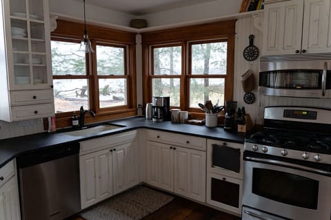 Gourmet kitchen with stainless appliances and granite countertops