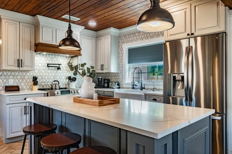 Enjoy our gorgeous, modern kitchen, stocked w/everything needed to cook a meal