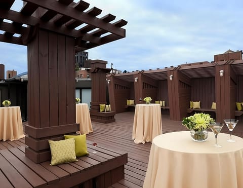 Sip cocktails under open skies on the stylish rooftop deck.