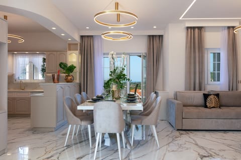 The fully equipped kitchen and adjacent dining table for 8 provide all the essentials so you can prepare a homemade meal and try some Cretan recipes with your loved ones!