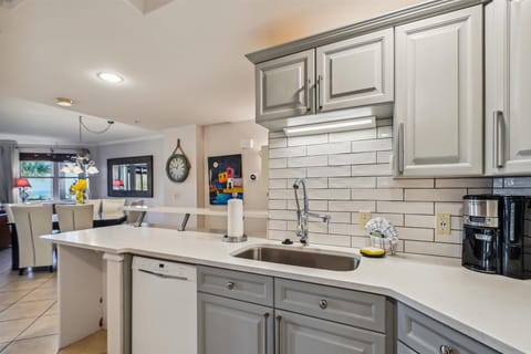 Has dishwasher and regular coffee maker.