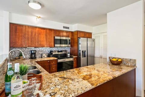 Cook with ease in this fully equipped kitchen featuring sleek stainless steel appliances