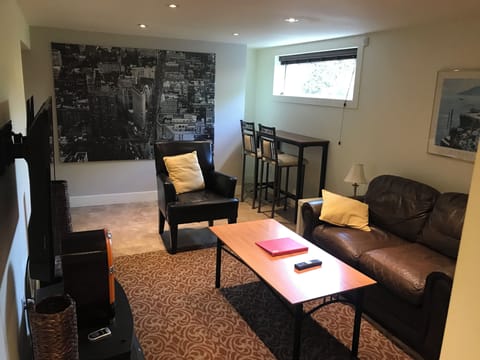 living room with 50" TV full cable 