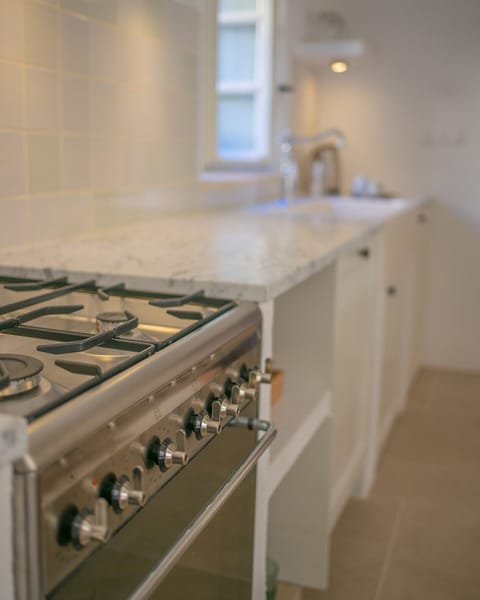 Italian SMEG oven with Carrara marble and oak kitchen