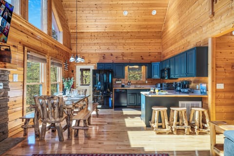 Dining table that sits 8 people. Plus there are 3 stools by the kitchen island.