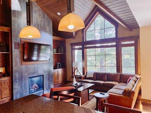 Living Room: As you step into the cabin, you'll be welcomed by our spacious and cozy living area.