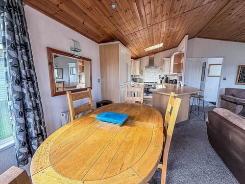 Cozy dining area with warm wood accents and natural light