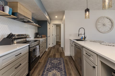 Spacious kitchen with ample countertop space 