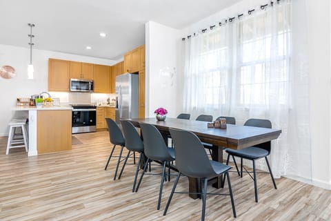 Dine together in this sunlit space with seating for your entire group!