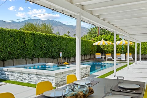 Luxurious 2600 sq ft backyard with pool, mountain views, and privacy amid ficus trees