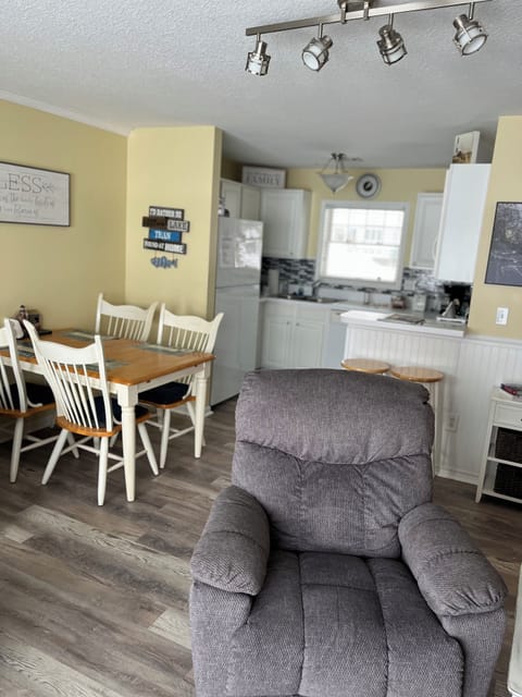 New vinyl flooring in living room,  kitchen, entry and hall.