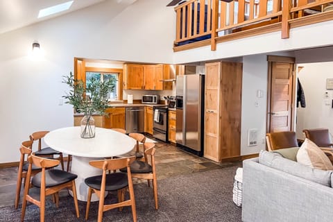 Vaulted living and dining area