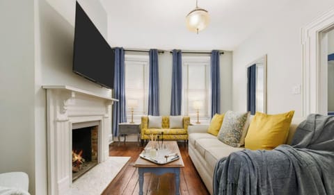 Relax in style! Our living room features a fireplace and Smart TV.