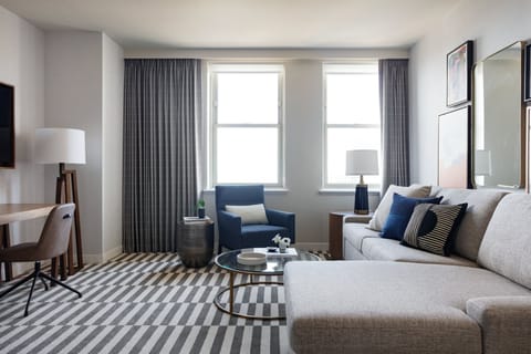 Unwind on the plush sectional in bright, airy comfort.