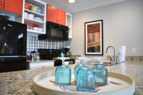 Enjoy the kitchen and bar area while cooking a meal