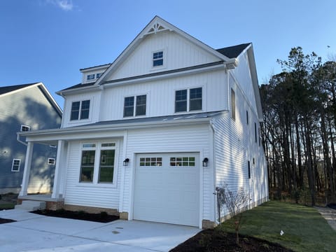 Front of house. 2 car Driveway. Street parking available. Max 5 cars-town rules.