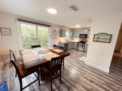 Unit B dining room and kitchen areas. 