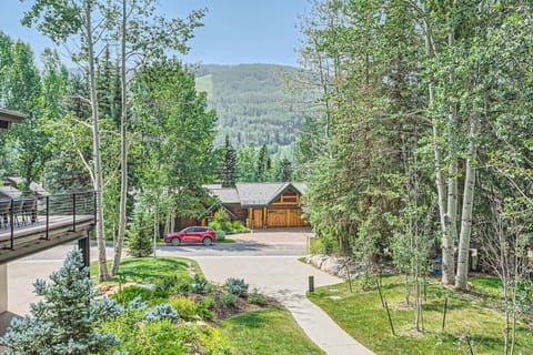 The balcony adjacent to the living room offers a serene escape, featuring comfortable seating and panoramic views of the surrounding mountains. It`s the perfect spot for morning coffee or evening relaxation, blending indoor and outdoor living.