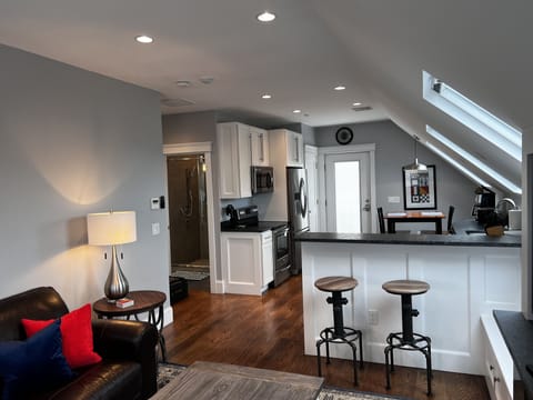 Four skylights brighten the fully-equipped kitchen & living room.