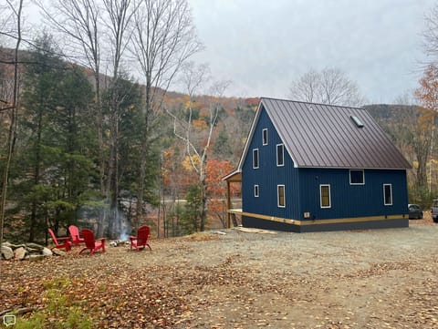 View of the cabin upon arrival, looking East towards the creek below. 