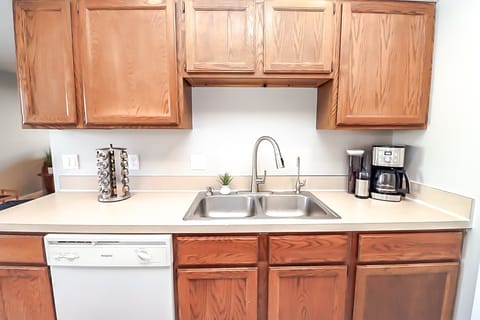 Double-sided sink and coffee are also present.