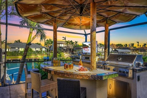 View of the Outdoor Kitchen/Bar overlooking the direct Gulf access canal