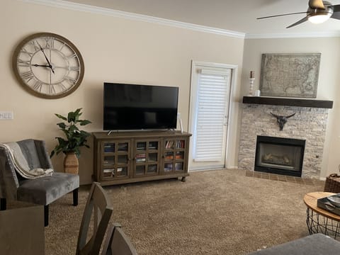Comfortable living room with big screen TV.