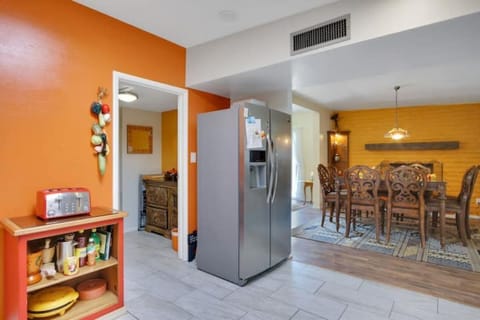 Plenty of room to work in the kitchen, and an 8 seat dining table. 