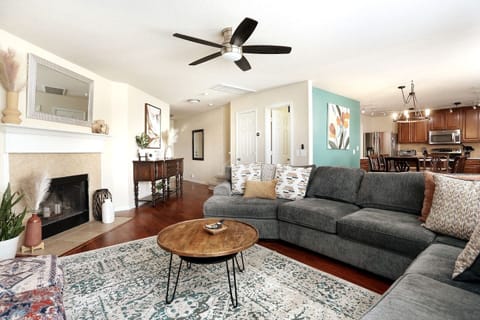 Gather the whole crew around for a game night and meaningful conversation. This beautifully-decorated living room is the perfect backdrop for making memories to last a lifetime!