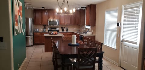 Have a seat at the elegant dining table and enjoy your favorite dishes surrounded by family and friends. Add the extra table leaf and chairs to make room for additional guests. There’s room for everyone at this table!