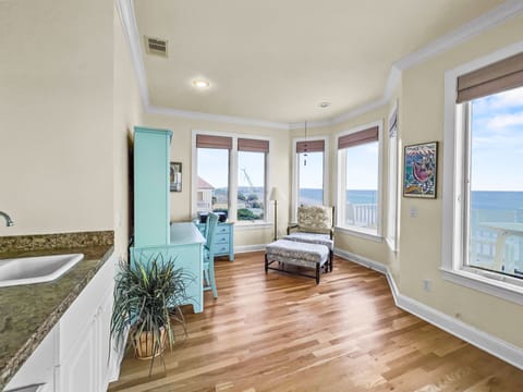 Over 500 square feet with multiple seating areas, kitchenette and private balcony