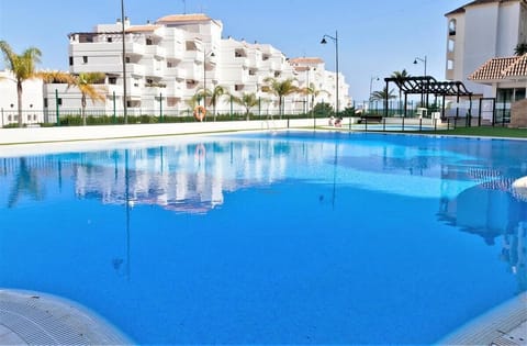 Community swimming pool is located around 200 metres from the property