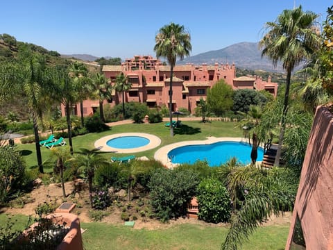 Overlooking the swimming pool.