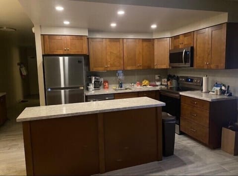 Kitchen Island with Granite Countertops.