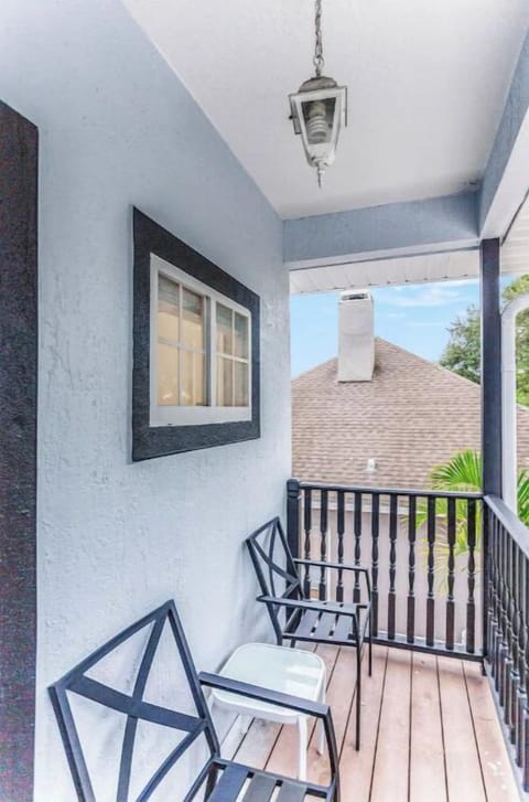 Enjoy a higher view of the palm trees from above on this terrace.