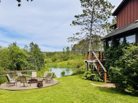 North Shore house rental with a large yard, pond views and firepit - a peaceful retreat by the scenic Lester River.