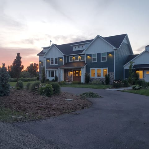 Front view of property with mudroom entrance on the right.