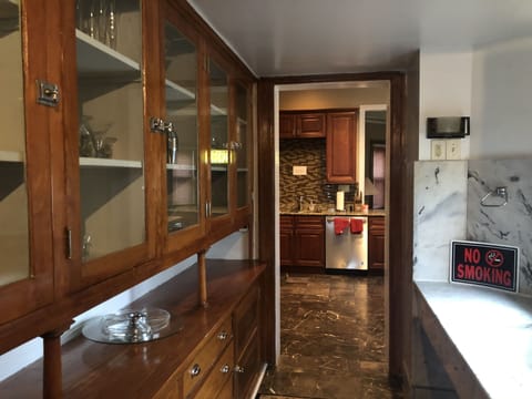 Butler Pantry with original marble sink; between kitchen and dining room