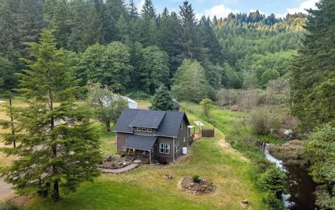 Property with the beaver pond behind the house